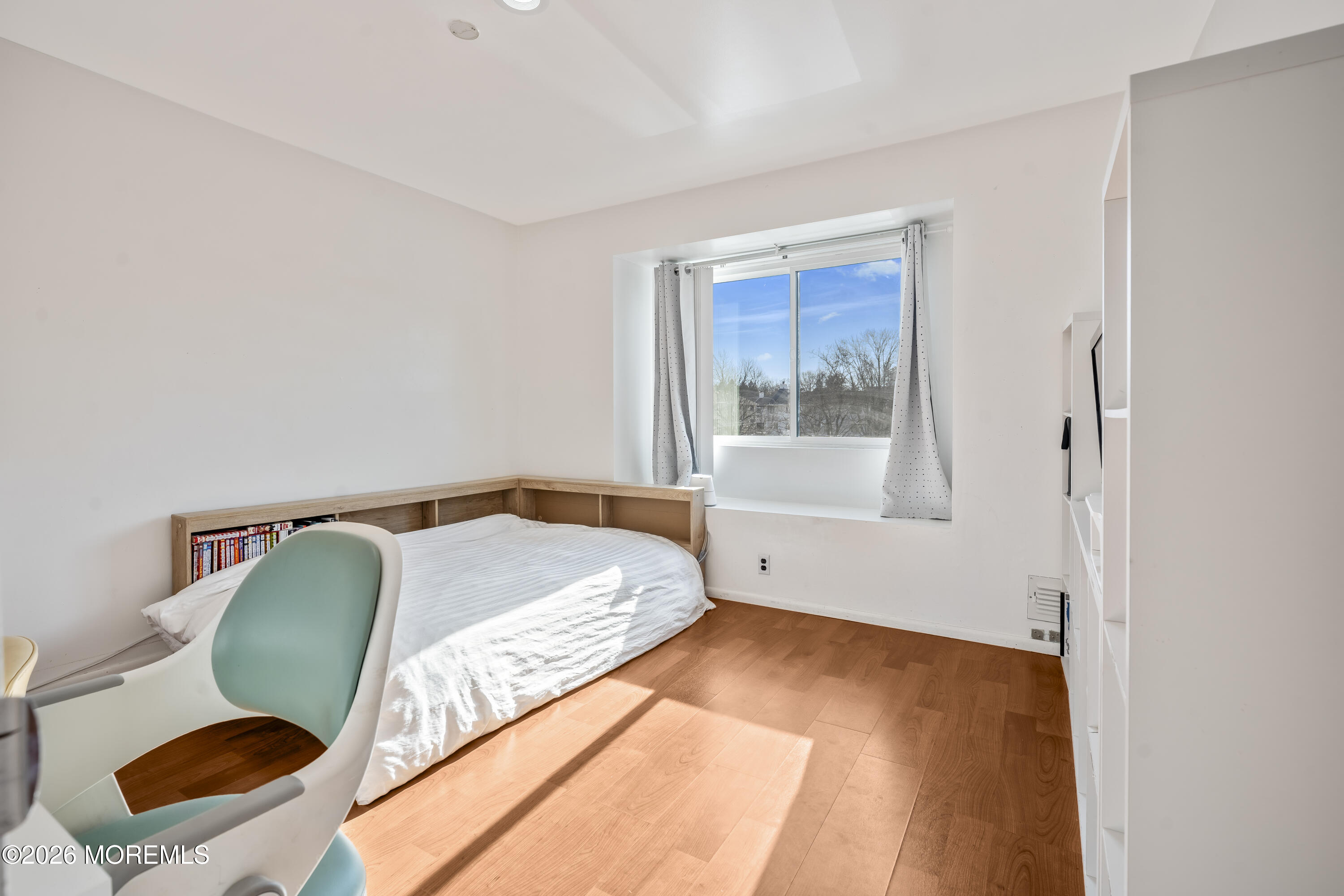 424 Middlewood Road Middletown, NJ 07748 - Photo 11 of 22 a bedroom with a bed and a large window