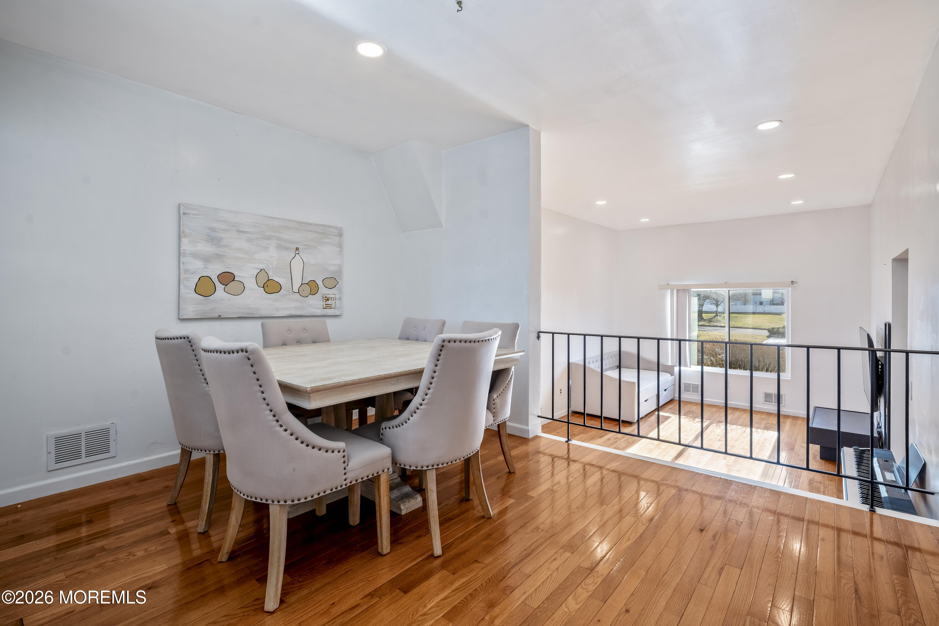 424 Middlewood Road Middletown, NJ 07748 - Photo 3 of 22 a view of a dining room with furniture wooden floor and next to a window