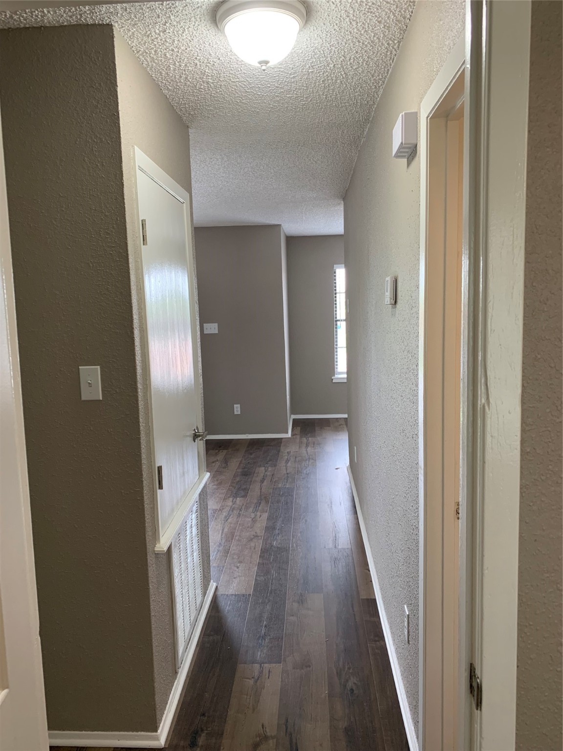 1601 Meadowview Drive Port Lavaca, TX 77979 - Photo 12 of 38 a view of hallway with wooden floor