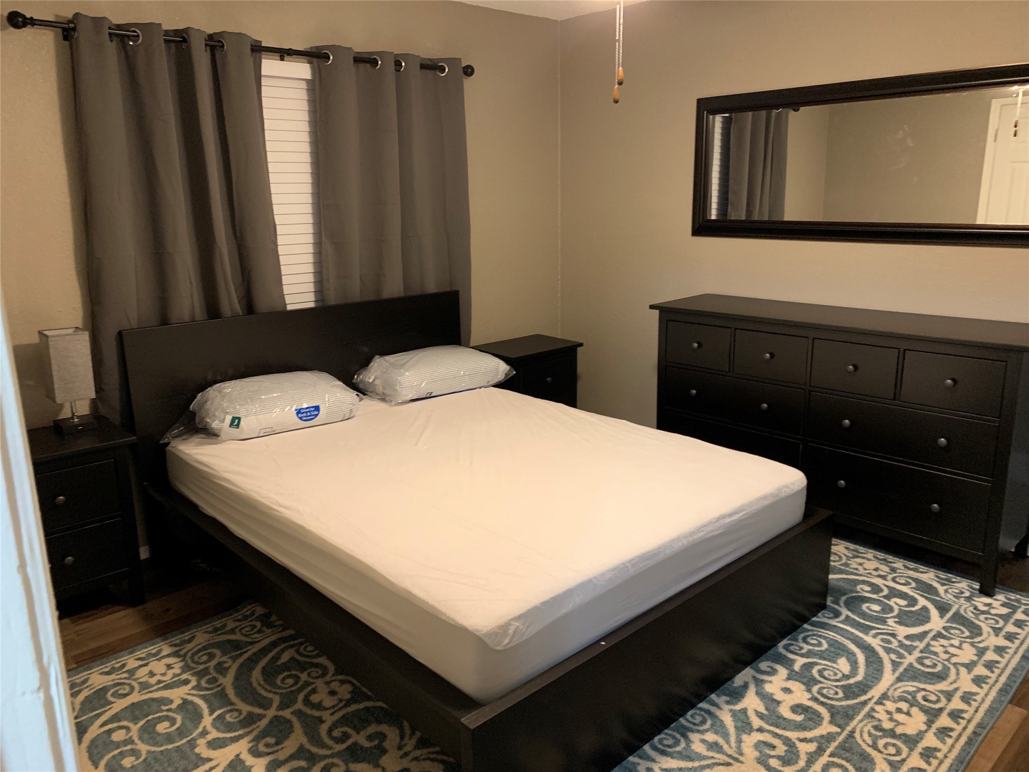 1601 Meadowview Drive Port Lavaca, TX 77979 - Photo 19 of 38 a bedroom with a bed and a dresser