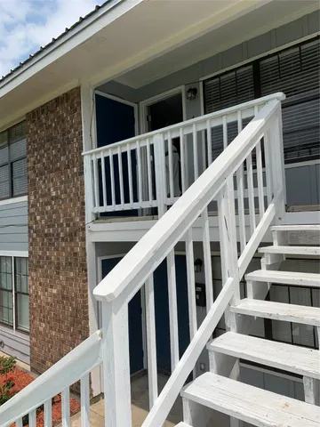 a view of balcony with staircase