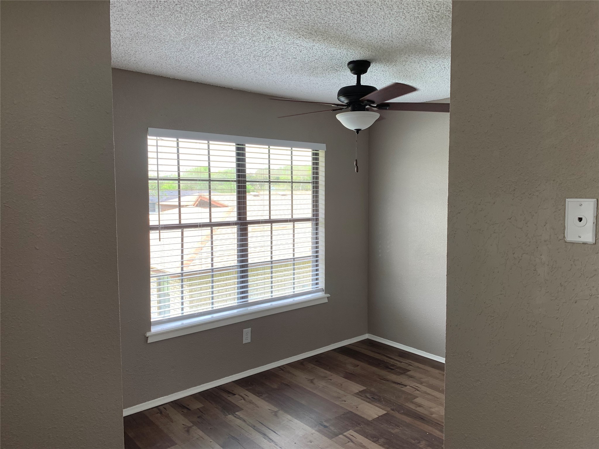 1601 Meadowview Drive Port Lavaca, TX 77979 - Photo 9 of 38 a view of empty room with wooden floor and fan