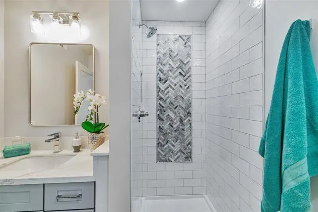 a spacious bedroom with a bed and a window