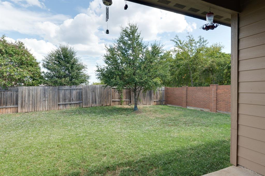 1853 Olive Lane Anna, TX 75409 - Photo 13 of 23 Fenced backyard with a patio area
