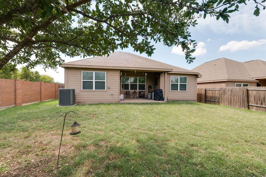1853 Olive Lane Anna, TX 75409 - Photo 14 of 23 Back of property featuring a patio area and a fenced backyard