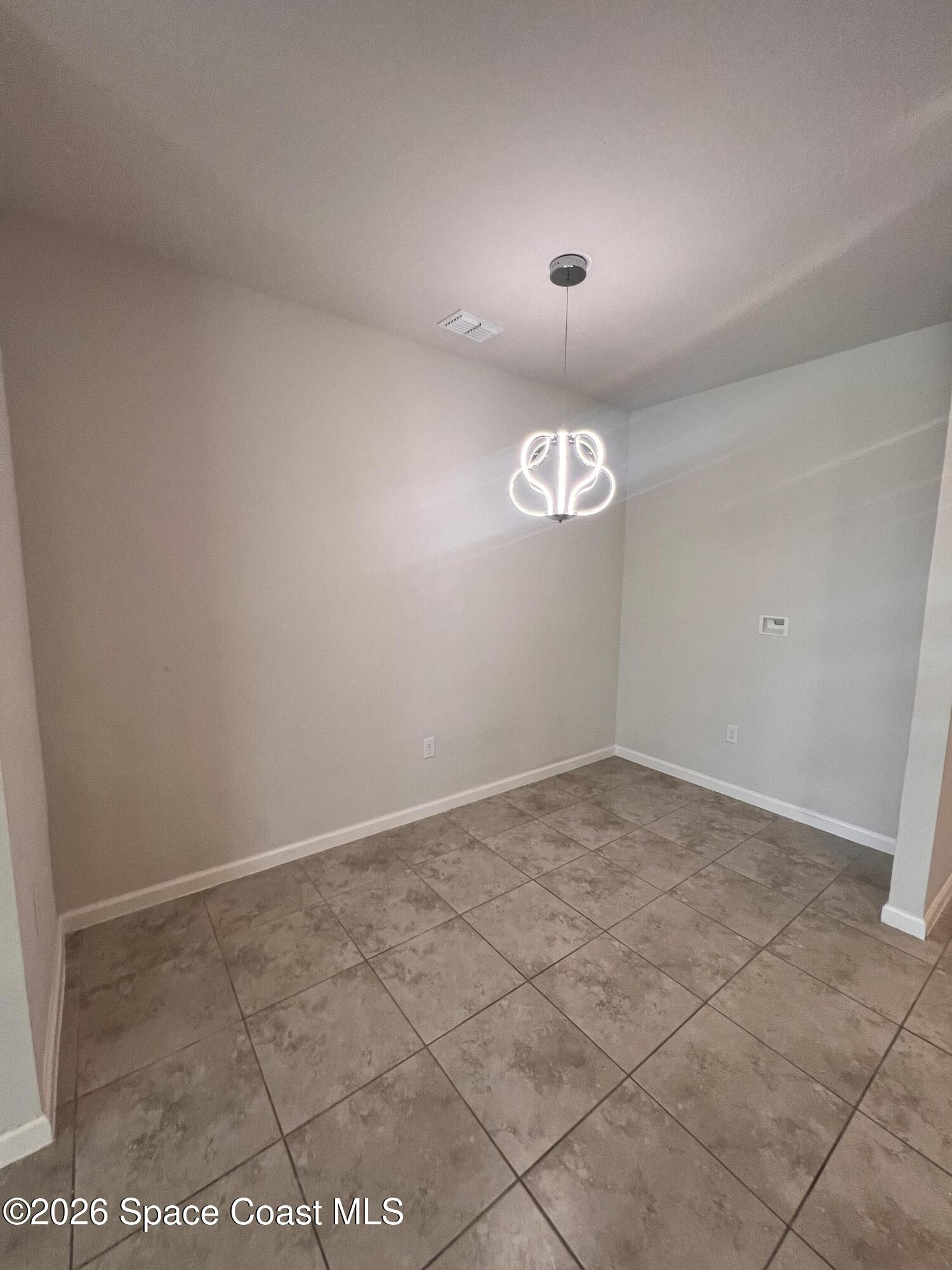 3517 Rixford Way Palm Bay, FL 32909 - Photo 4 of 11 20260805_142229892_iOS