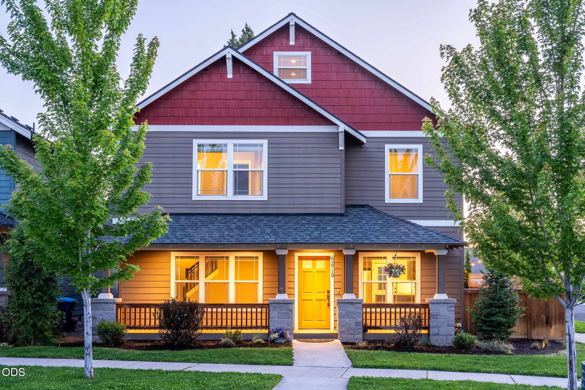 62719 Hawkview Road Bend, OR 97701 - Photo 1 of 56 a front view of a house with yard and green space