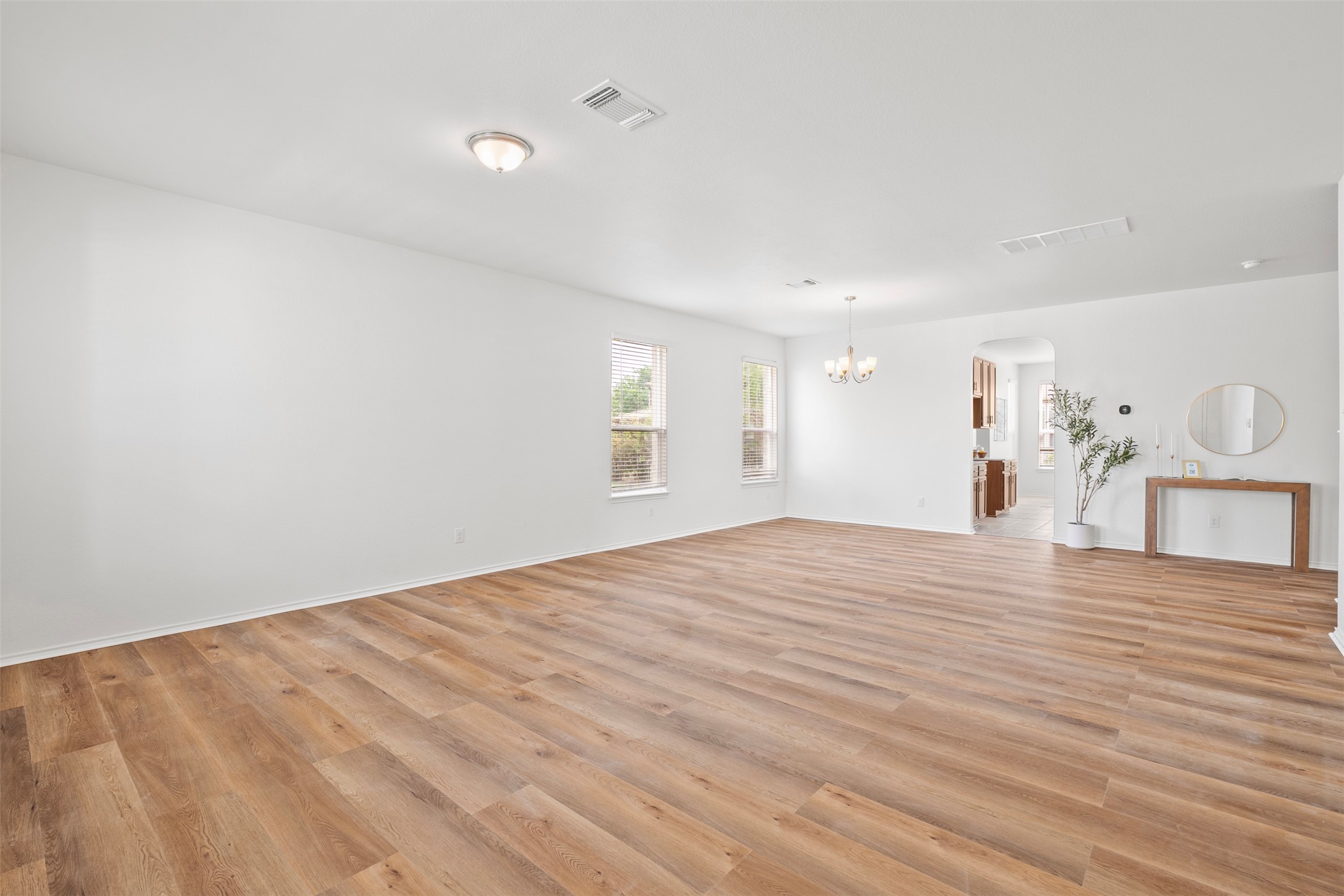 116 Kyndals Meadow Cove Georgetown, TX 78628 - Photo 14 of 36 a view of empty room with wooden floor
