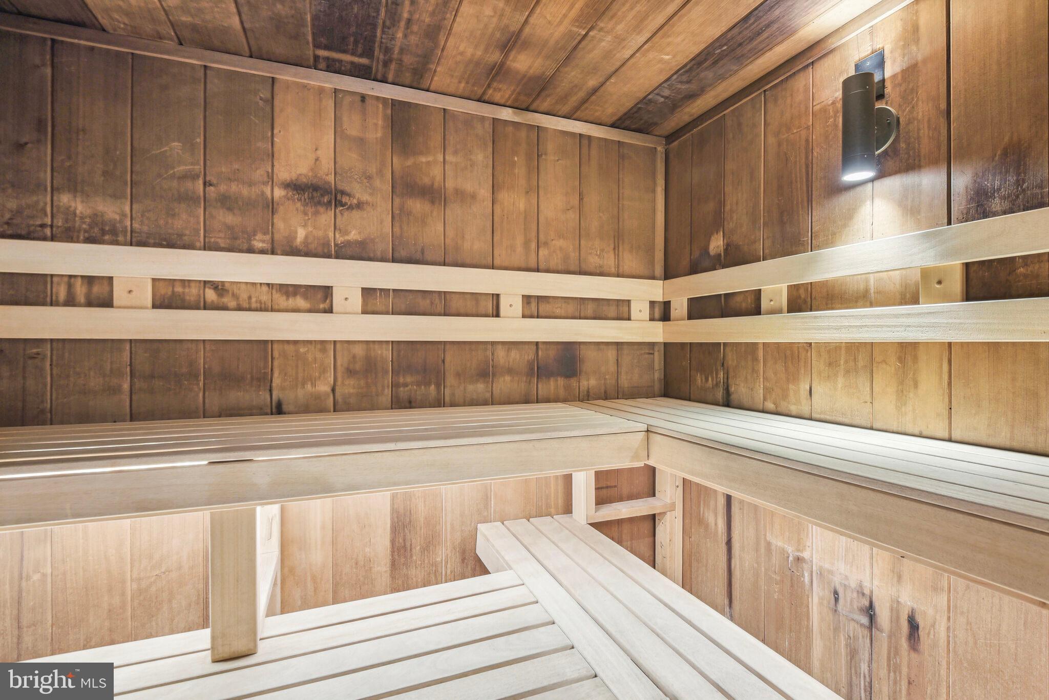 4200 Massachusetts Avenue Northwest, Unit 106 Washington, DC 20016 - Photo 45 of 48 a view of a kitchen with wooden floor and a window