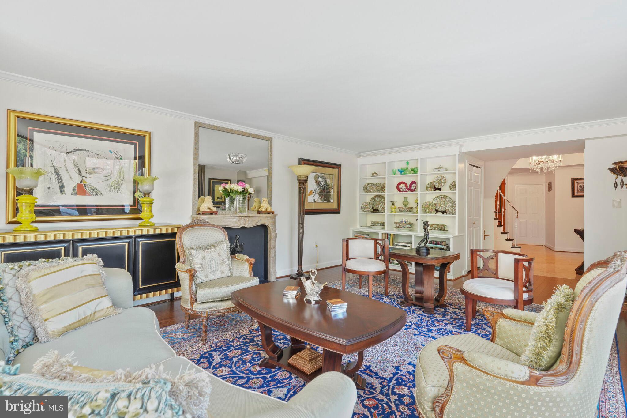 4200 Massachusetts Avenue Northwest, Unit 106 Washington, DC 20016 - Photo 9 of 48 a living room with furniture and a table