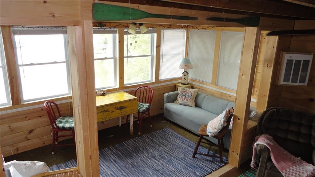 109 Pleasant Point Road Vassalboro, ME 04989 - Photo 3 of 27 Enclosed porch overlooking Webber Pond