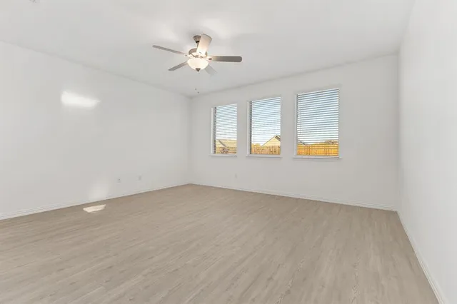 an empty room with window