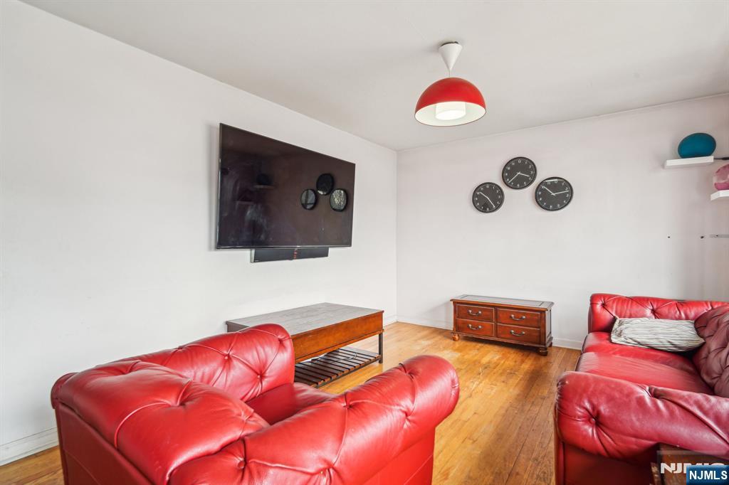 163 Kent Street Hackensack, NJ 07601 - Photo 4 of 19 a living room with furniture