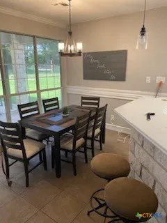 a bedroom with a bed and a night stand