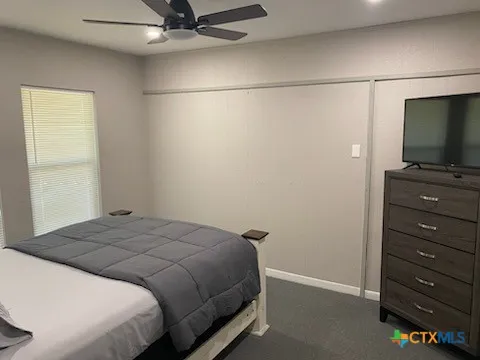 a picture of a bathroom with a window and a shower