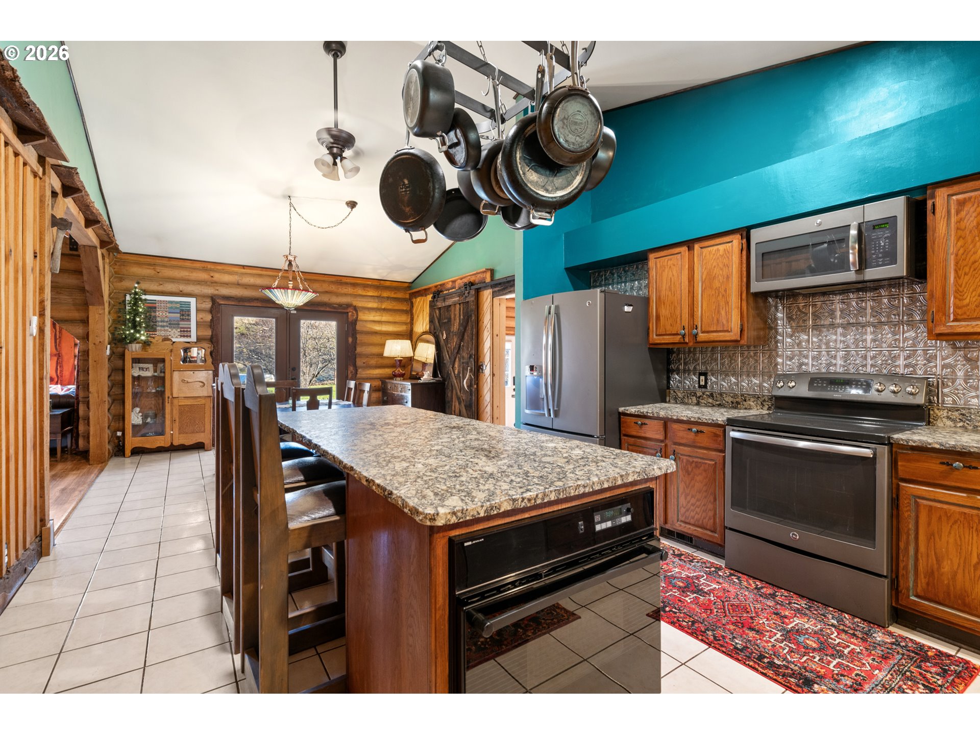 74091 Thornhollow Road Adams, OR 97810 - Photo 19 of 48 a kitchen with a stove and a wooden floor