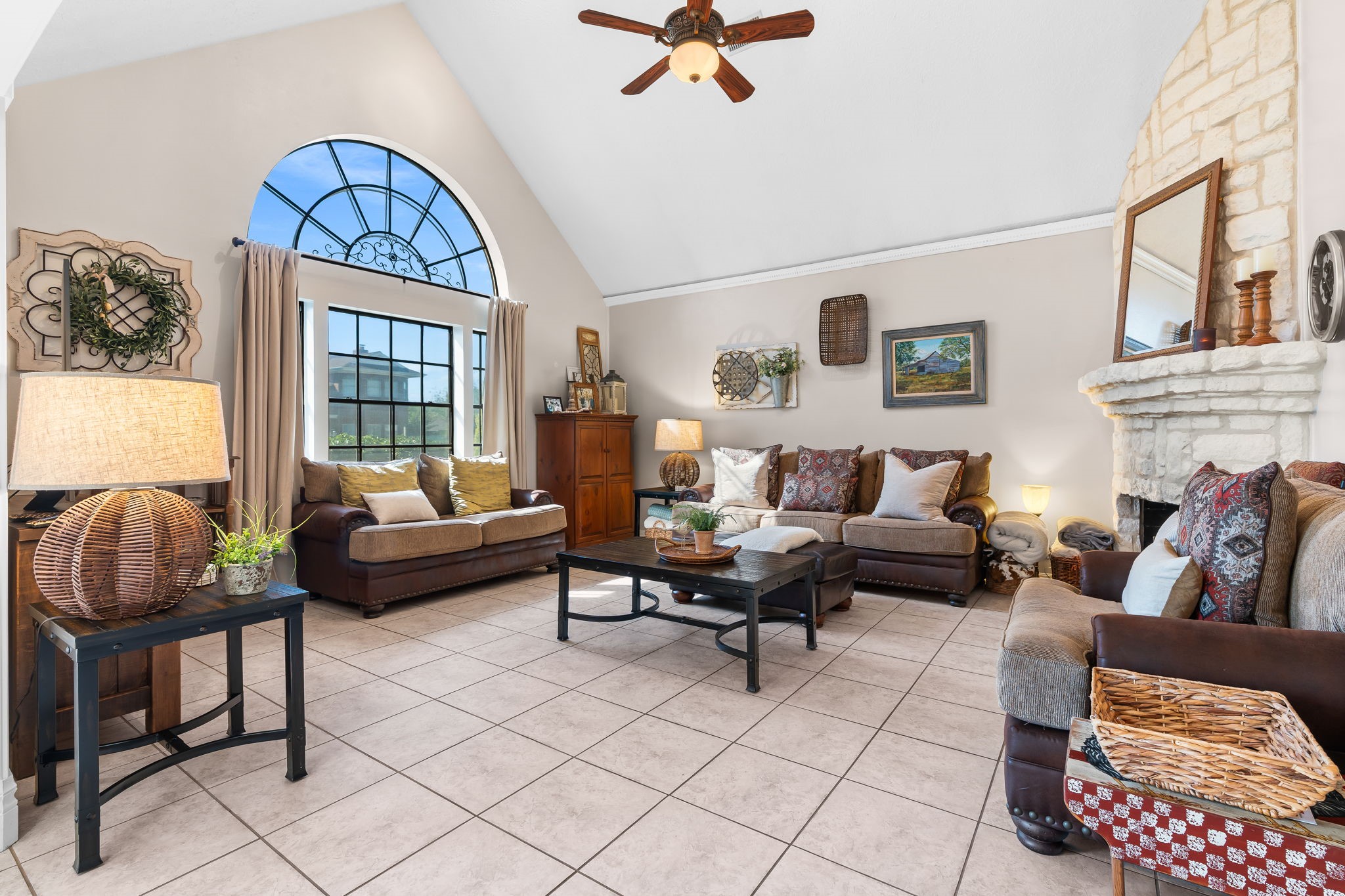 6971 Breezy Point Willis, TX 77318 - Photo 12 of 49 The Family room has a huge front window with pretty arched transom above.