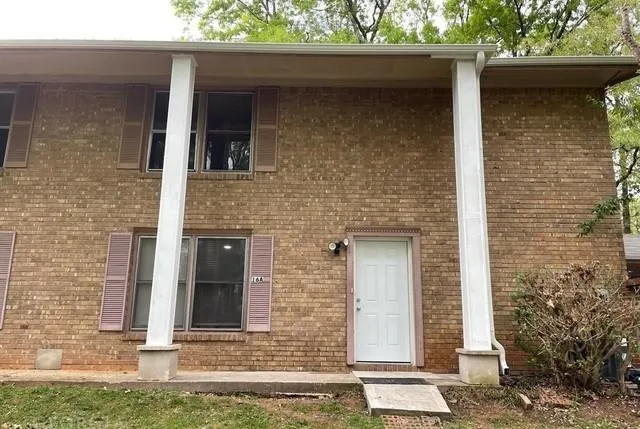 a front view of a house with stairs