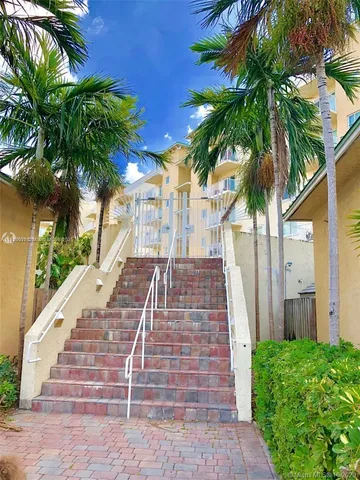 a view of a backyard with plants