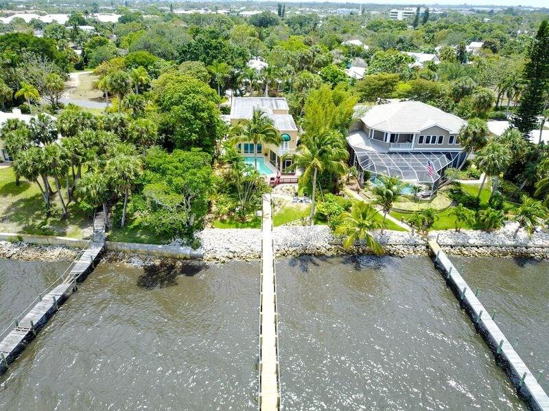 1509 Southeast Riverside Drive Stuart, FL 34996 - Photo 23 of 26 a view of a swimming pool with a yard