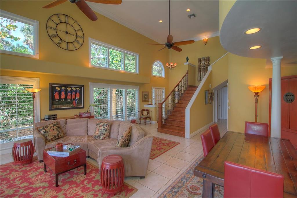 1509 Southeast Riverside Drive Stuart, FL 34996 - Photo 4 of 26 a living room with furniture and a large window