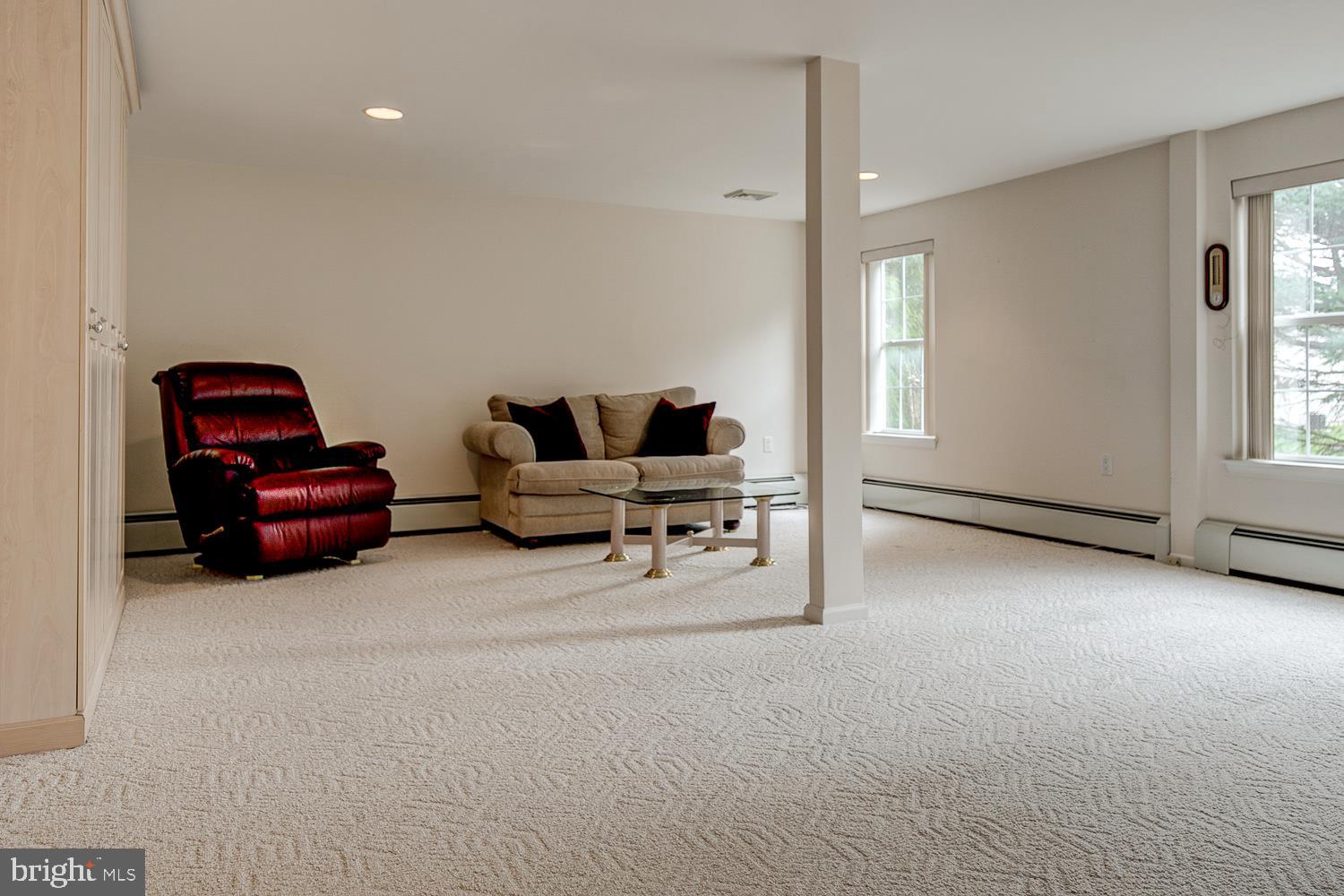 1447 Quaker Ridge West Chester, PA 19380 - Photo 20 of 25 LOWER LEVEL WITH SLIDERS TO PATIO