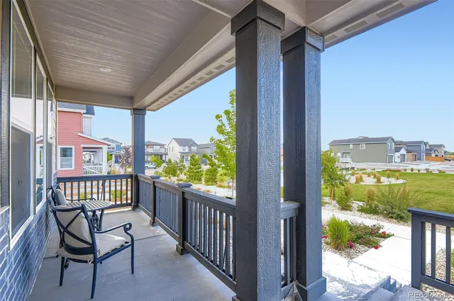 a view of a porch with furniture