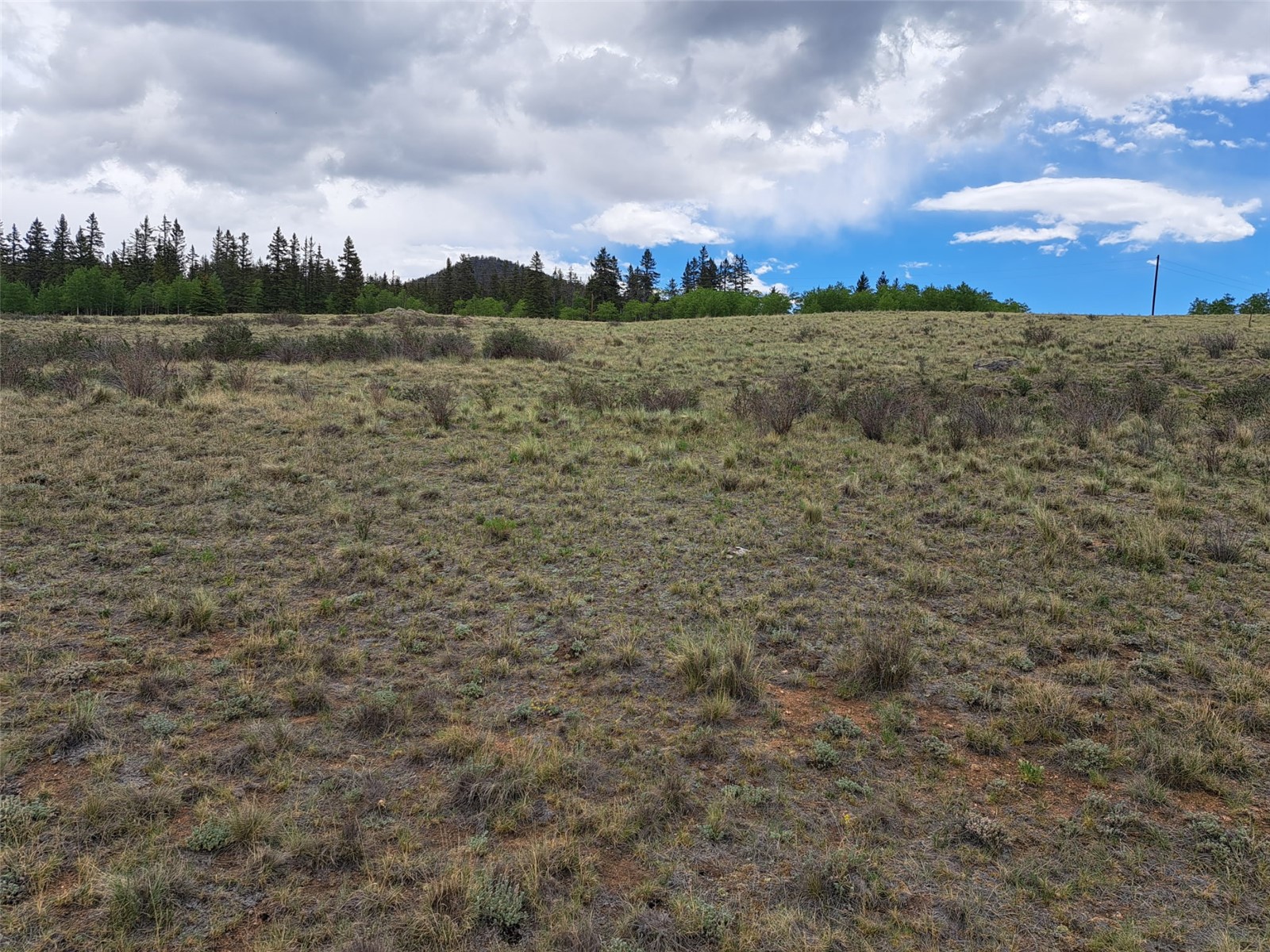 80 Longbow Court Como, CO 80456 - Photo 21 of 24 a view of a lake in middle of the middle of the town