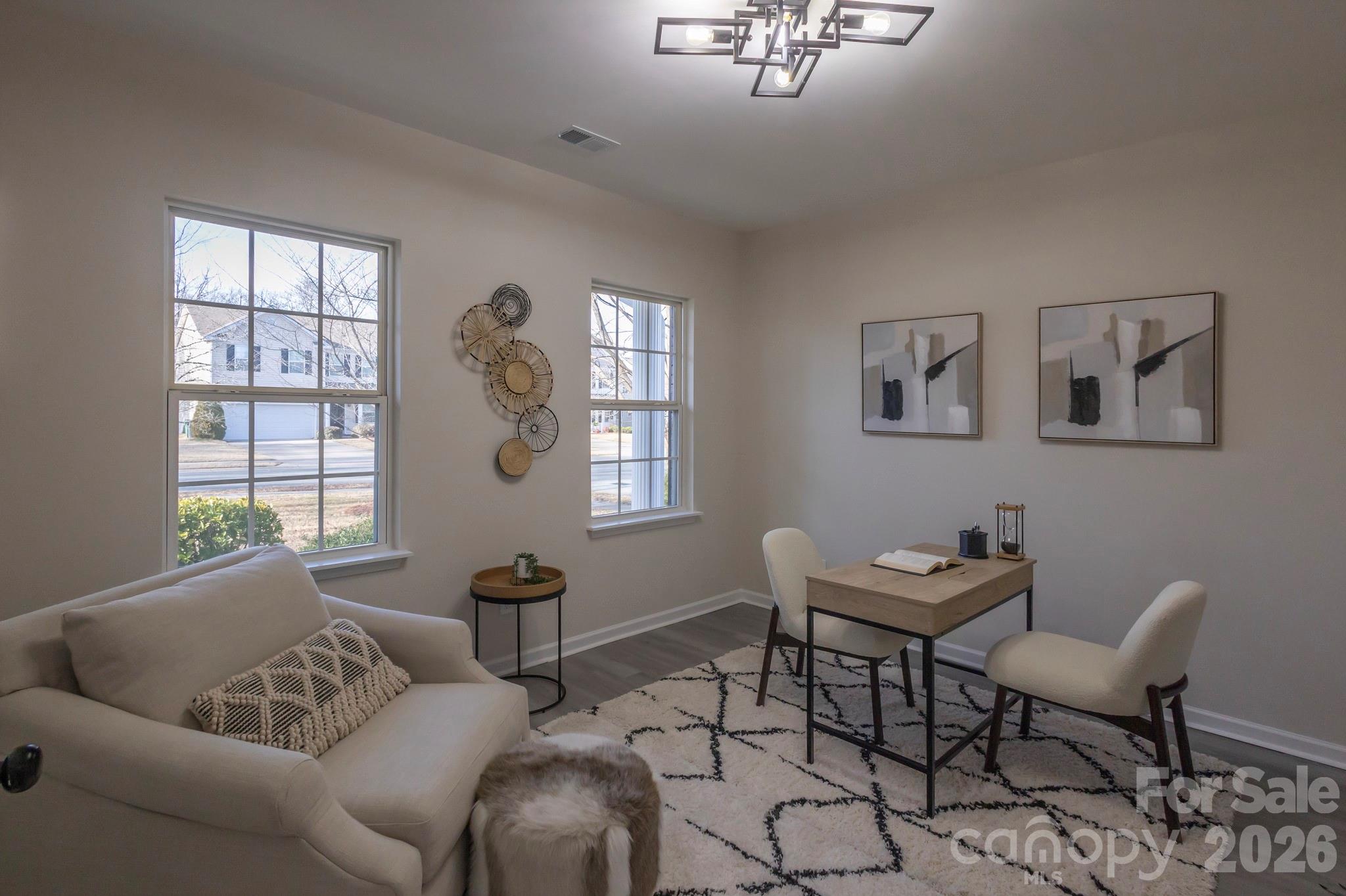 10631 Atkins Ridge Drive Charlotte, NC 28213 - Photo 14 of 38 a living room with furniture and a window
