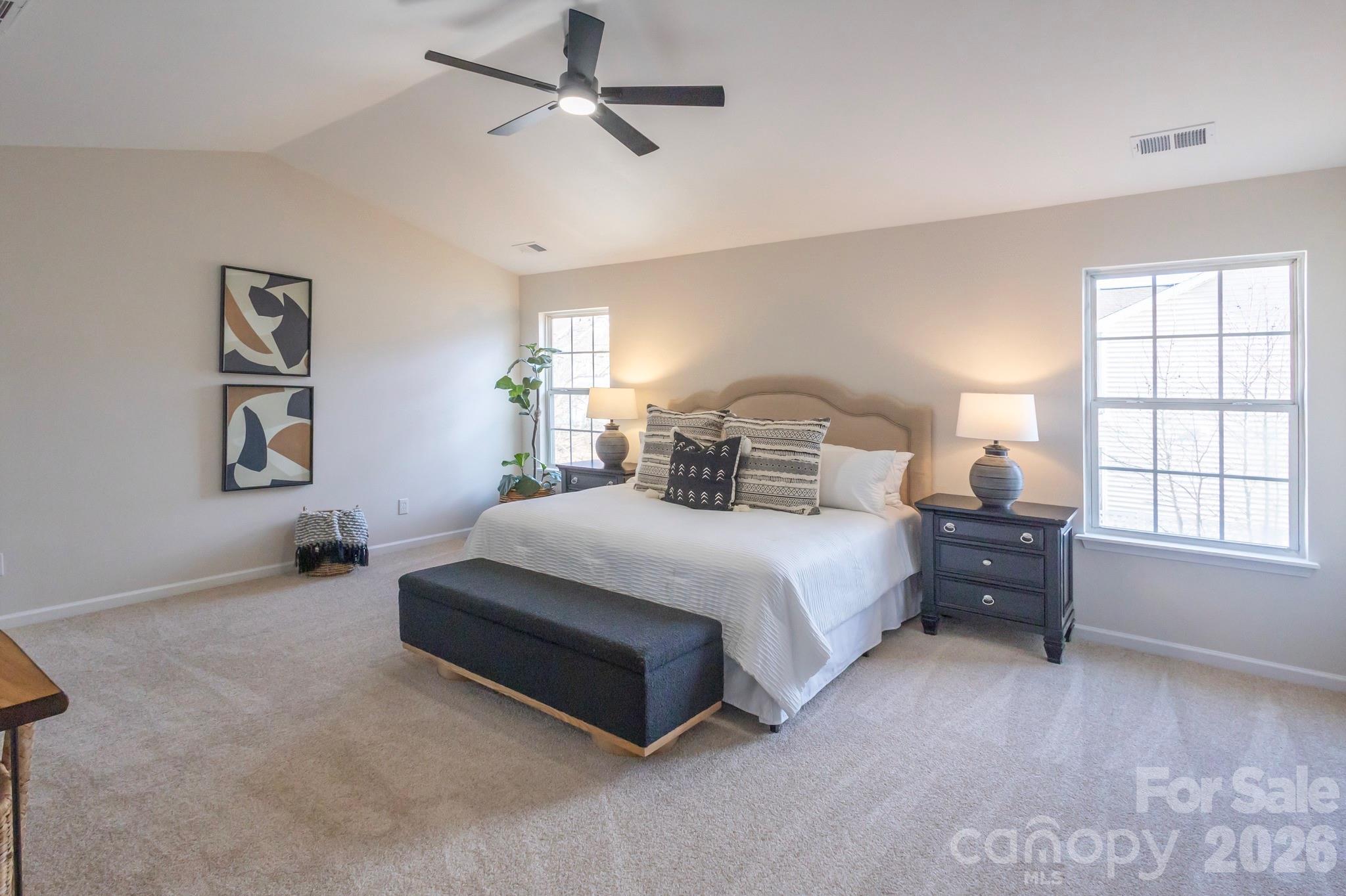 10631 Atkins Ridge Drive Charlotte, NC 28213 - Photo 17 of 38 a bedroom with a bed and window
