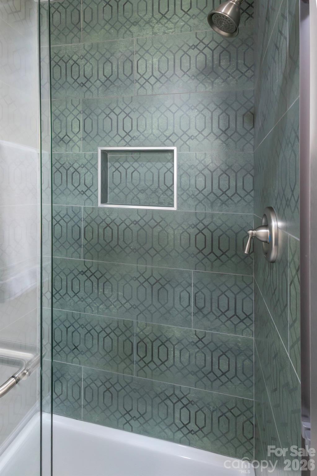 10631 Atkins Ridge Drive Charlotte, NC 28213 - Photo 19 of 38 a bathroom with a shower