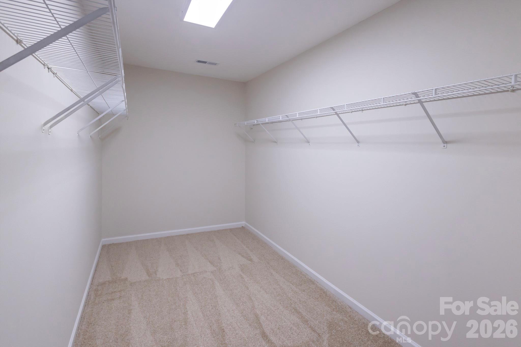 10631 Atkins Ridge Drive Charlotte, NC 28213 - Photo 23 of 38 a view of a room with racks on the wall
