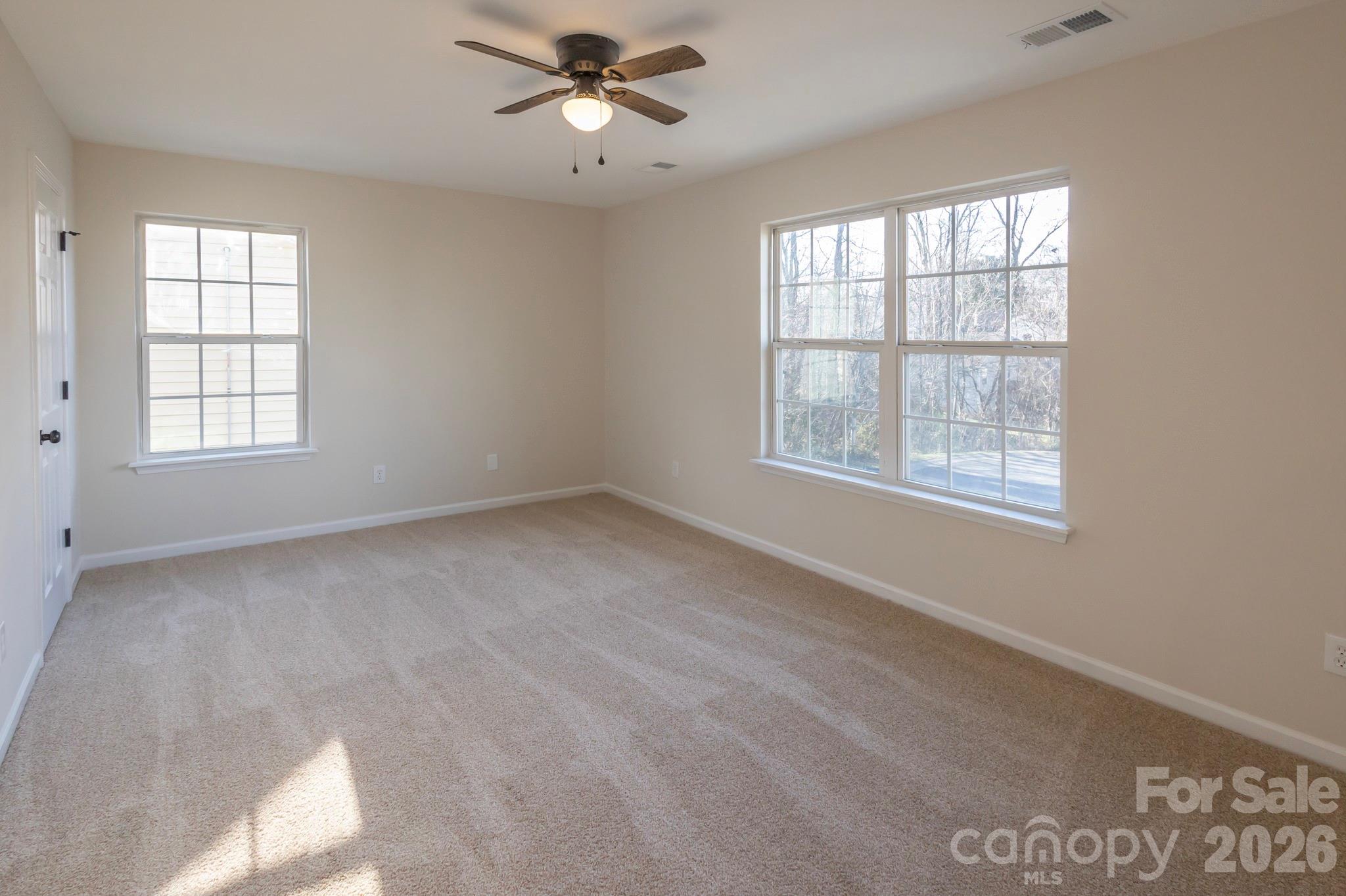 10631 Atkins Ridge Drive Charlotte, NC 28213 - Photo 25 of 38 a view of an empty room with a window