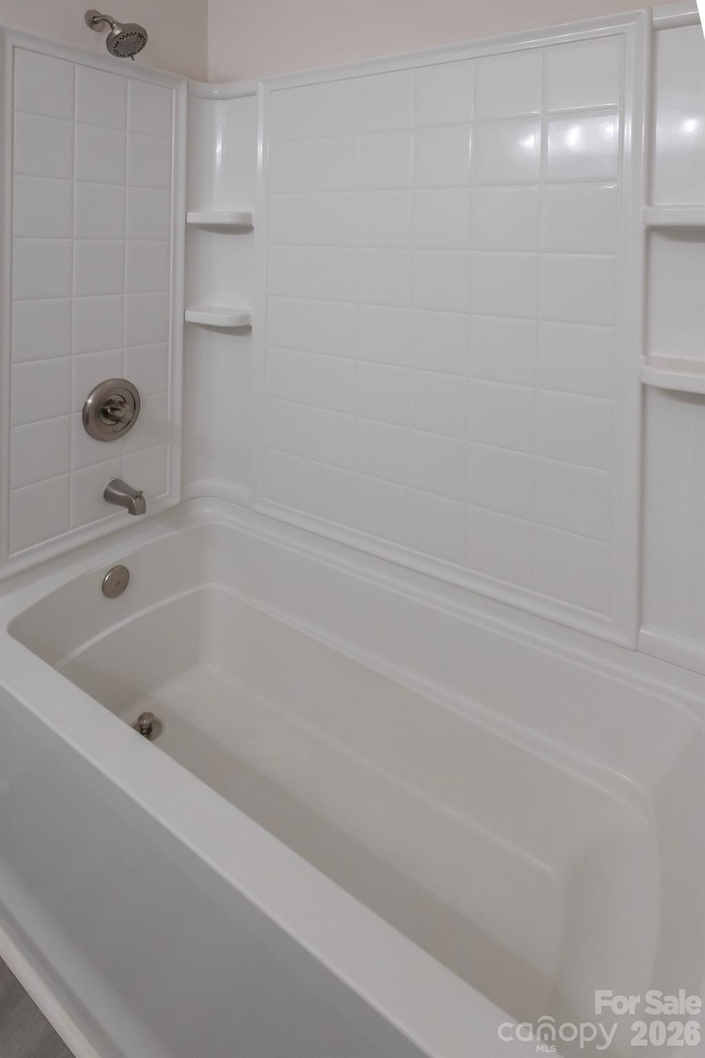 10631 Atkins Ridge Drive Charlotte, NC 28213 - Photo 27 of 38 a close view of a bathtub in bathroom