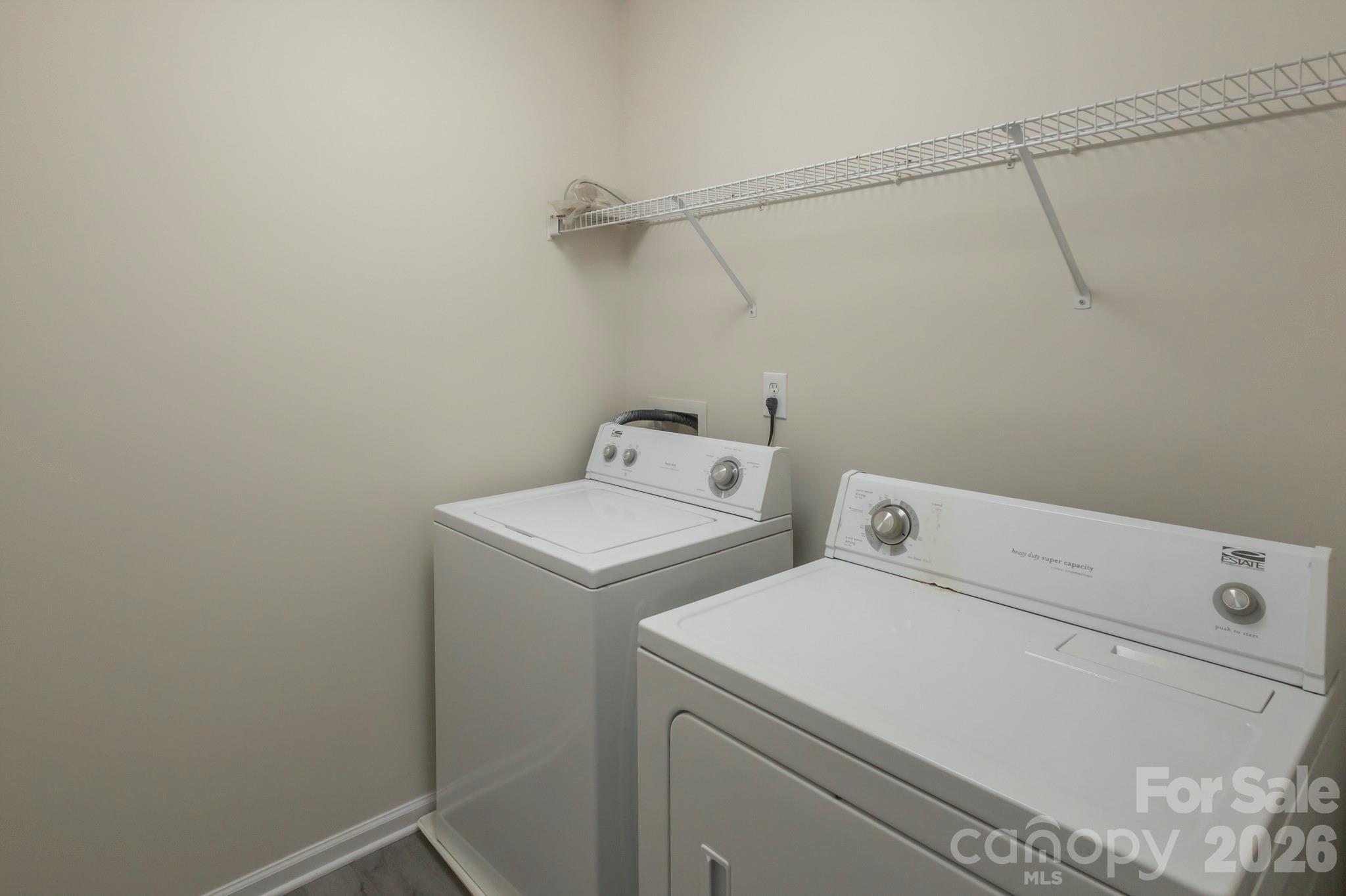 10631 Atkins Ridge Drive Charlotte, NC 28213 - Photo 29 of 38 a utility room with dryer and washer
