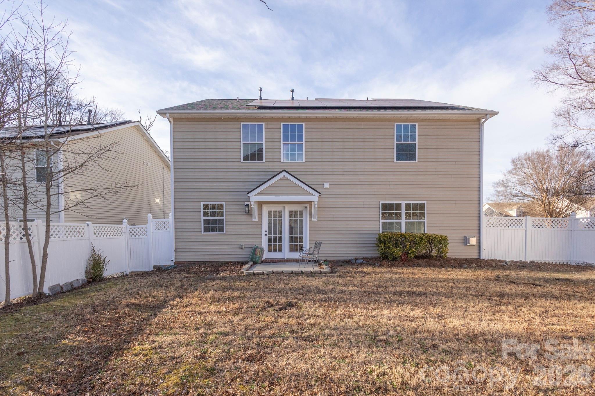 10631 Atkins Ridge Drive Charlotte, NC 28213 - Photo 30 of 38 a front view of a house with a yard