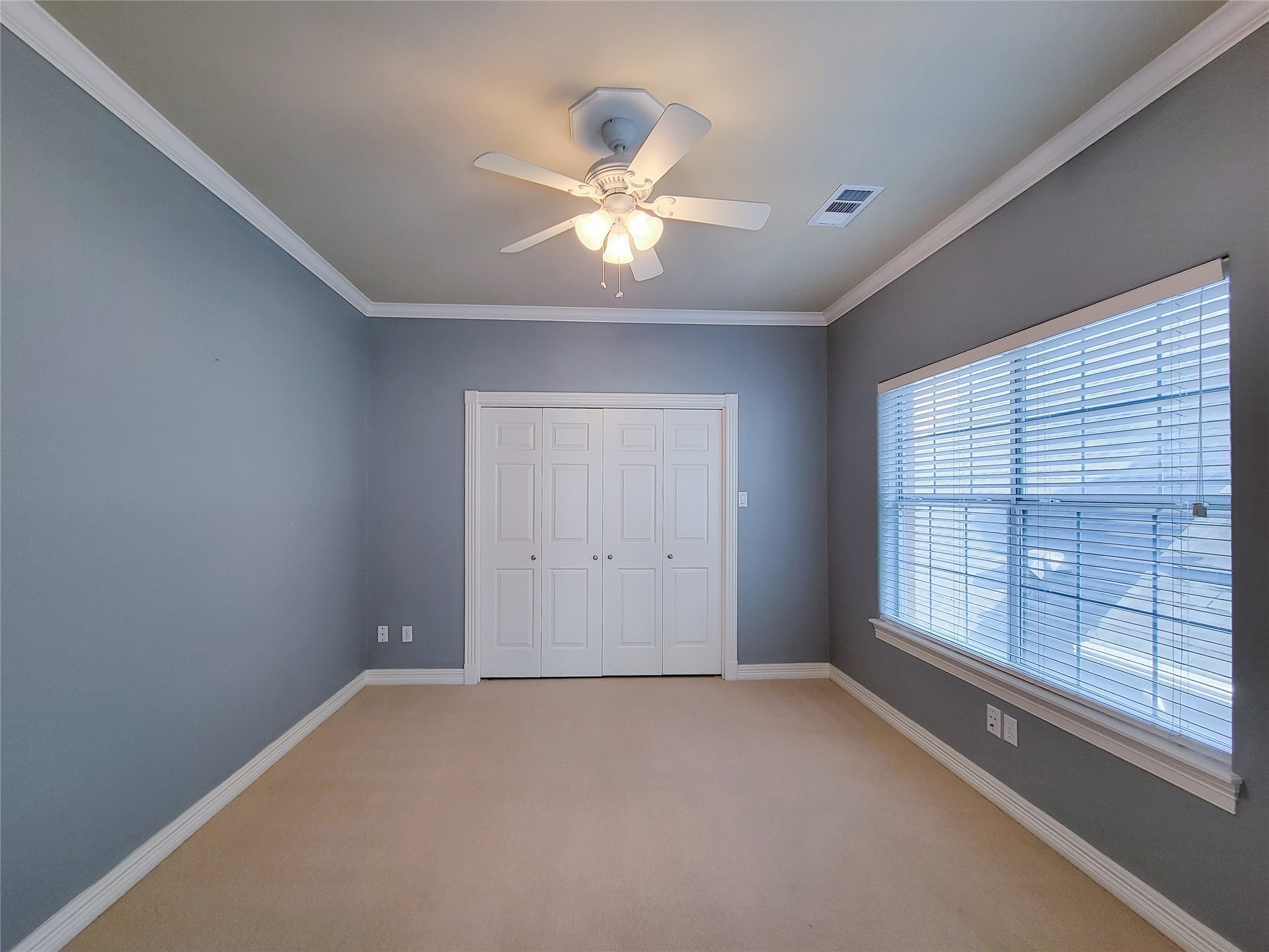 6304 Pickens Street, Unit B Houston, TX 77007 - Photo 12 of 15 a view of a livingroom with a ceiling fan and window