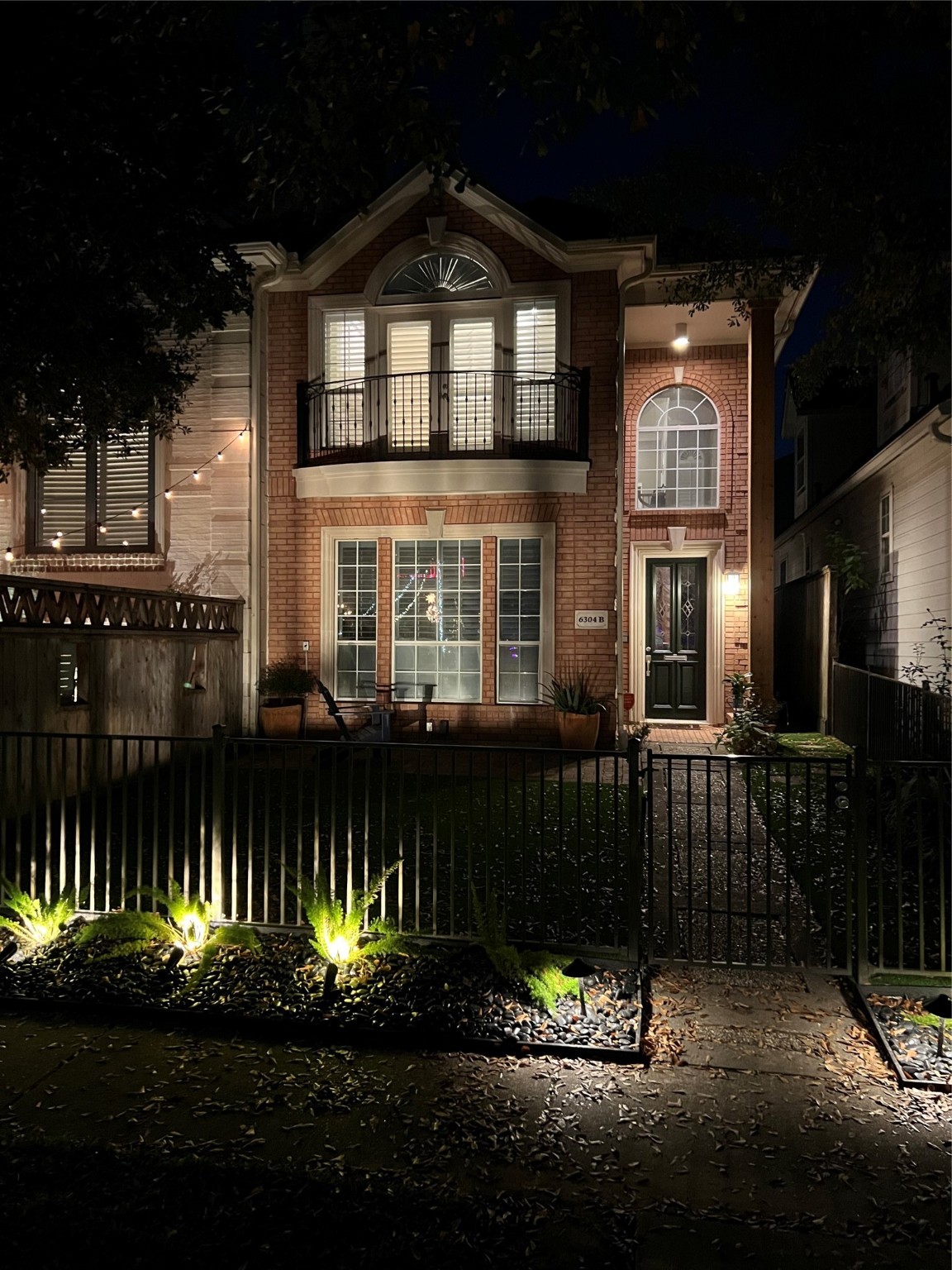 6304 Pickens Street, Unit B Houston, TX 77007 - Photo 15 of 15 a front view of a house with a yard
