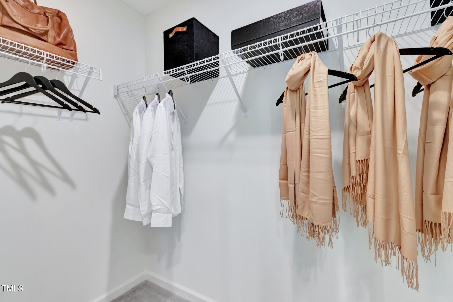 2101 Lambert Road, Unit 61 Cary, NC 27519 - Photo 28 of 54 14.1.Model.Primary.Walk.in.Closet