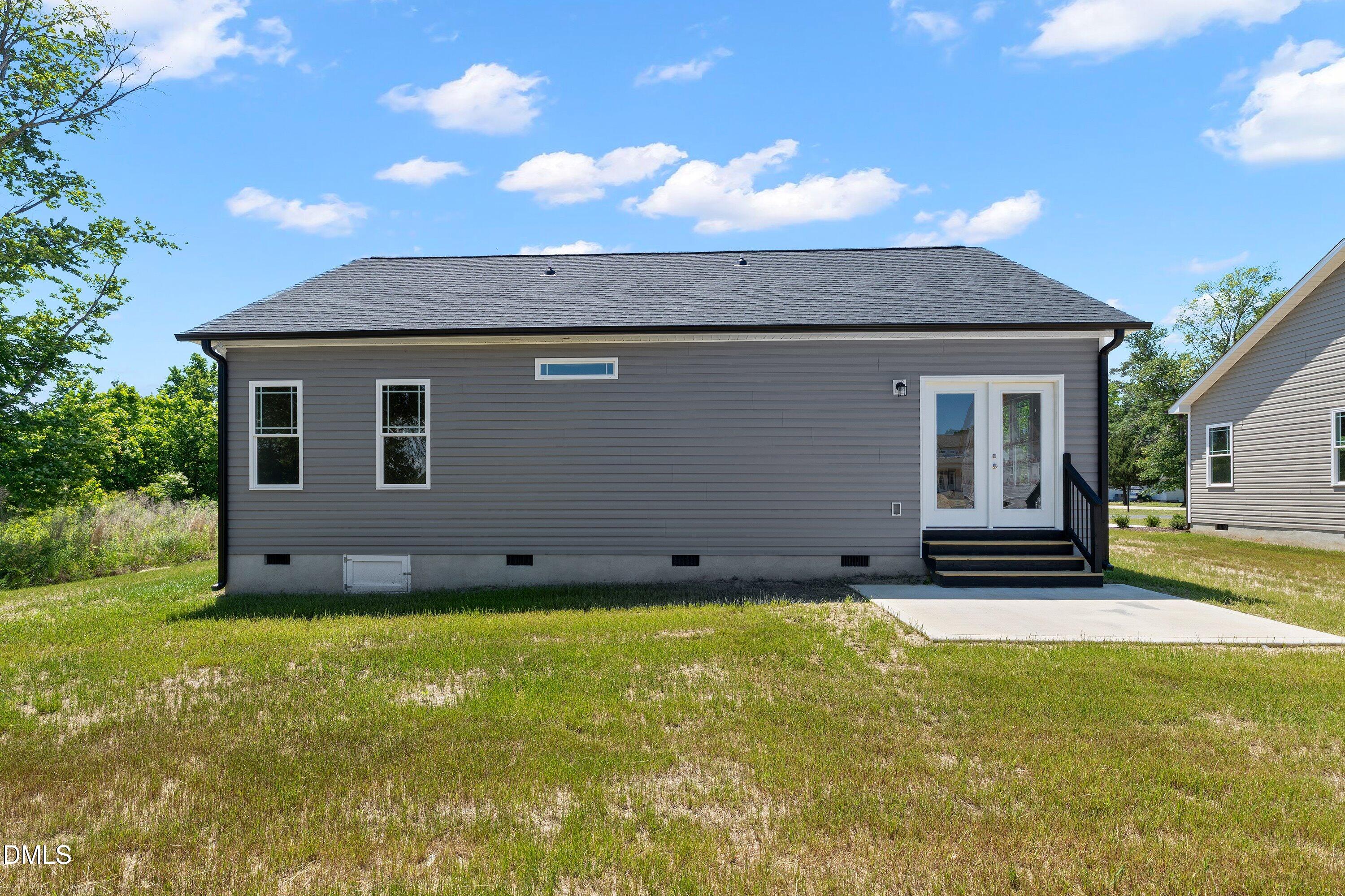 926 Micro Road West Selma, NC 27576 - Photo 40 of 41 a view of a house with a yard