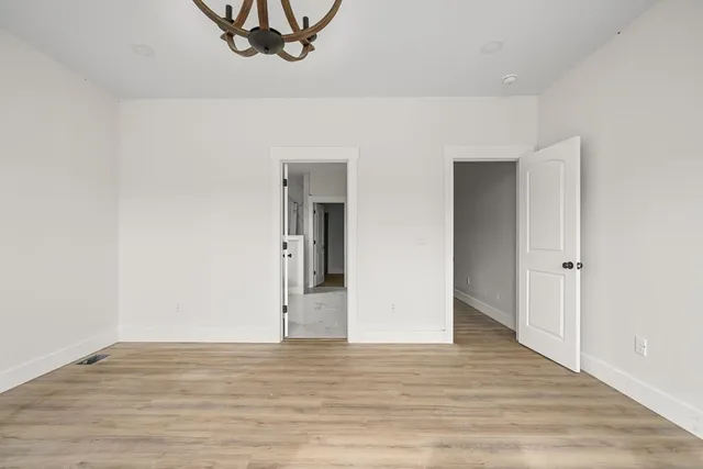 a view of a livingroom with wooden floor