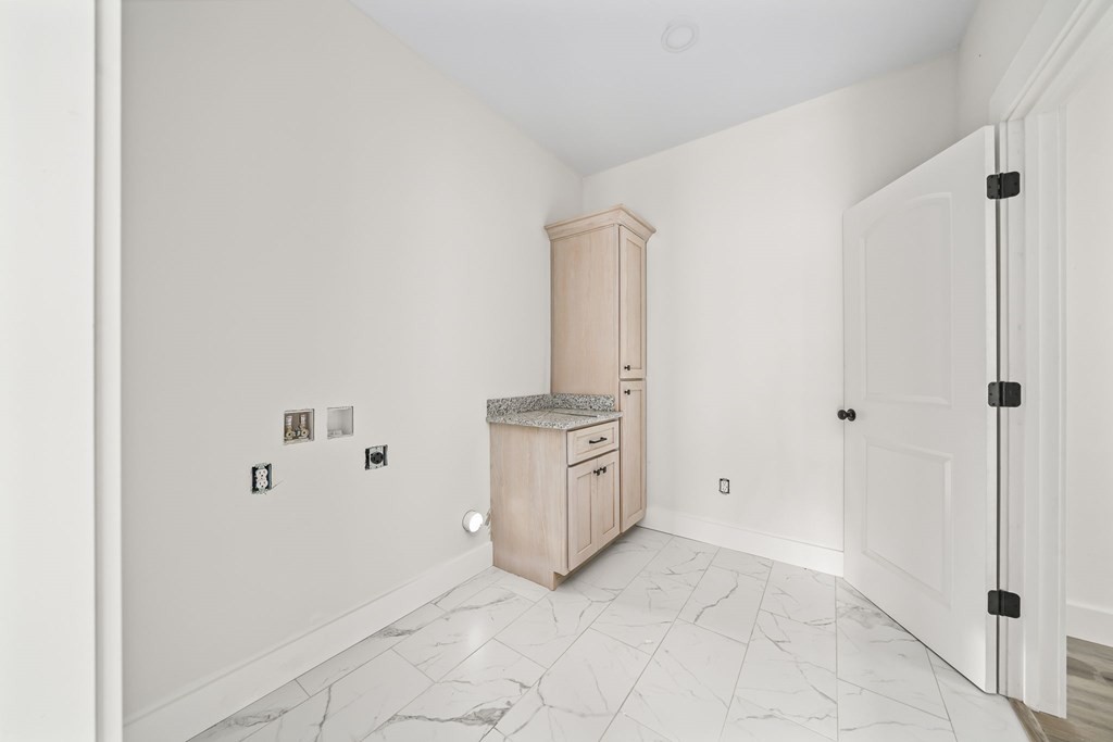 6584 Thomas Twin Oaks Road Baxter, TN 38544 - Photo 17 of 23 a view of a kitchen with white cabinets