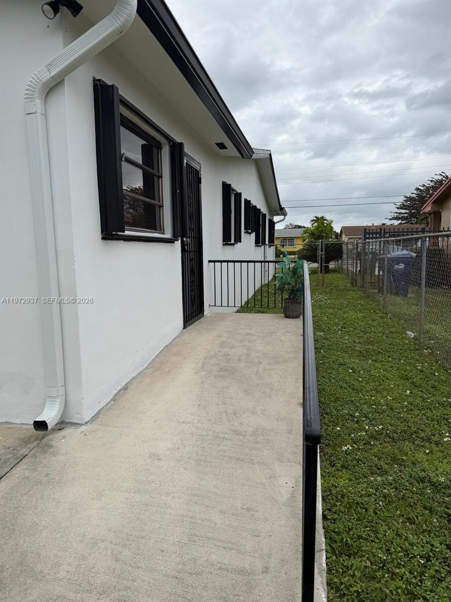 1350 Northwest 96th Street, Unit 2 Miami, FL 33147 - Photo 1 of 12 a view of a house with a yard