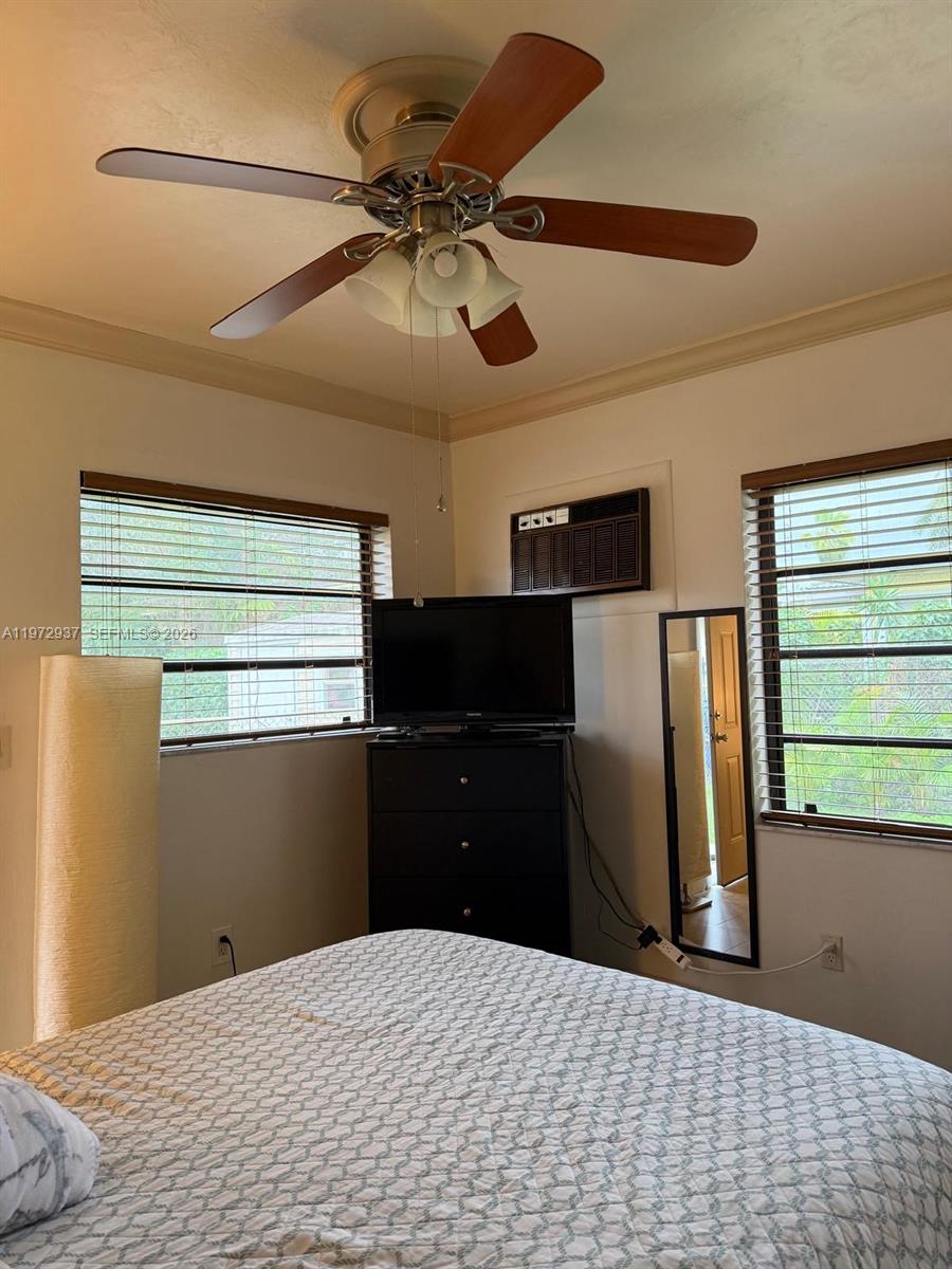 1350 Northwest 96th Street, Unit 2 Miami, FL 33147 - Photo 12 of 12 a kitchen with stainless steel appliances granite countertop a refrigerator a stove and a refrigerator