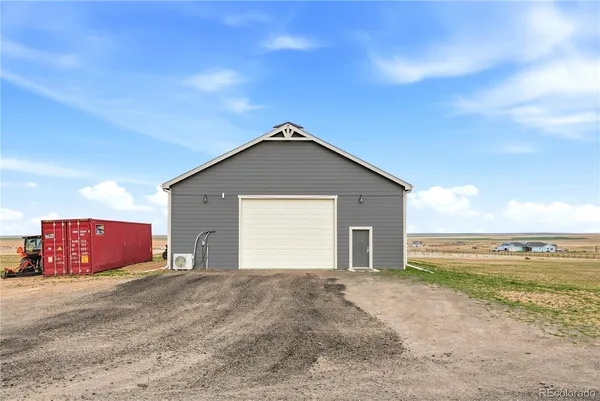 a front view of a house with yard