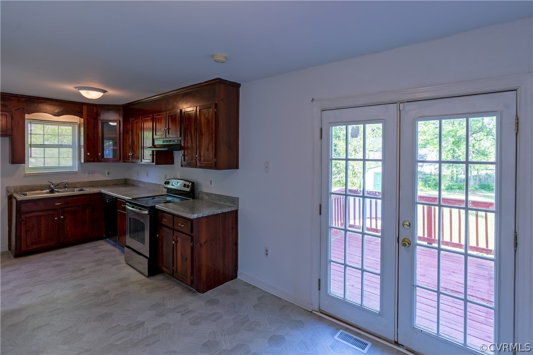 4025 Frye Terrace Colonial Heights, VA 23834 - Photo 18 of 30 a kitchen with stainless steel appliances granite countertop a stove and a sink