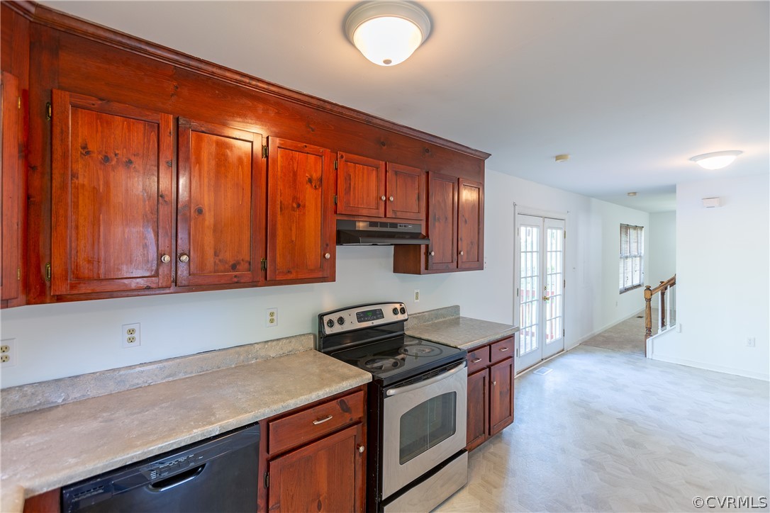 4025 Frye Terrace Colonial Heights, VA 23834 - Photo 19 of 30 a kitchen with stainless steel appliances granite countertop a stove a sink and a microwave