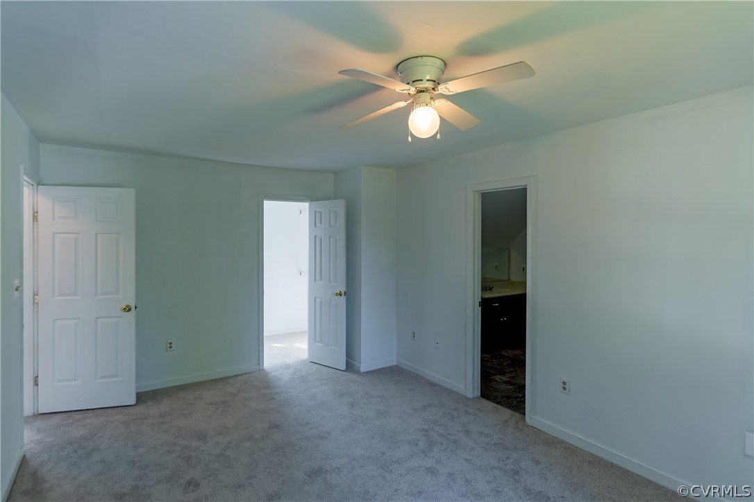4025 Frye Terrace Colonial Heights, VA 23834 - Photo 24 of 30 an empty room with closet and a chandelier fan
