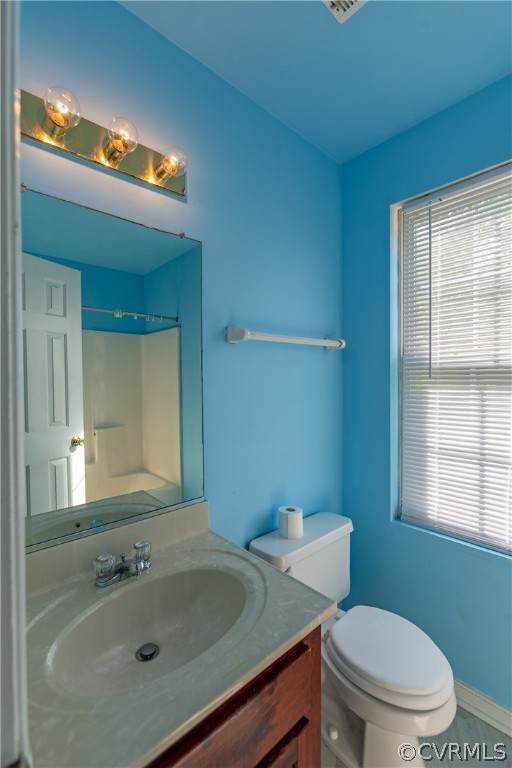 4025 Frye Terrace Colonial Heights, VA 23834 - Photo 29 of 30 a bathroom with a sink a toilet and mirror