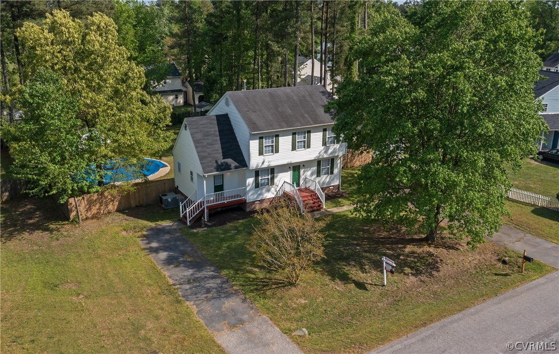 4025 Frye Terrace Colonial Heights, VA 23834 - Photo 8 of 30 a view of a small house in the back yard